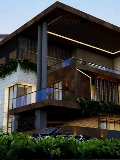 A bold, rustic-modern design for a 570 sq. yard plot in Varanasi. The facade uses corten steel-like panels and natural stone to create a powerful, earthy aesthetic.