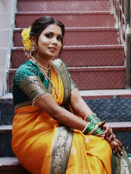 A gorgeous Maharashtrian bride. I loved creating this look with the traditional nauvari saree, nath, and a beautiful hairstyle featuring fresh yellow flowers.