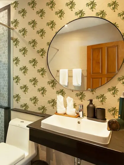 This bathroom is given a tropical makeover with our Beach Green Palm Tree wall sticker pattern. The design adds a fun and refreshing touch to the space.