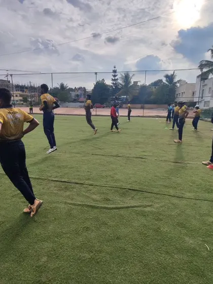 Players running through agility drills. Quick footwork is essential for running between the wickets and covering ground in the field.