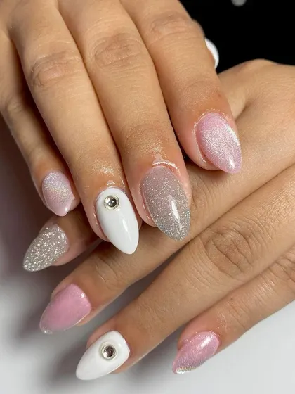 A cute and playful set with pink glitter, white, and rhinestone accents. This is a fun design for clients who love sparkle.