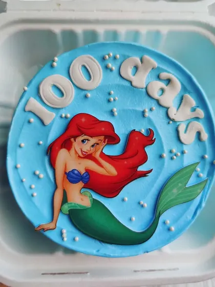 A Little Mermaid bento cake to celebrate 100 days. This mini cake is perfect for capturing those precious early milestones with a touch of Disney magic.