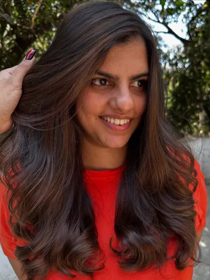 A portrait of the client with her refreshed highlights.
