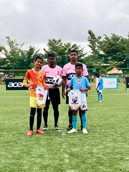 The U11 captains with the officials before their DPDL Super Cup match.