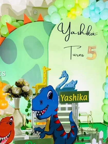 A fun and colorful dinosaur theme for a 5th birthday party.