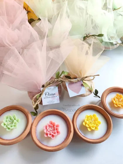A close-up of the Women's Day corporate gifts, showing the final packaged product with custom cards.