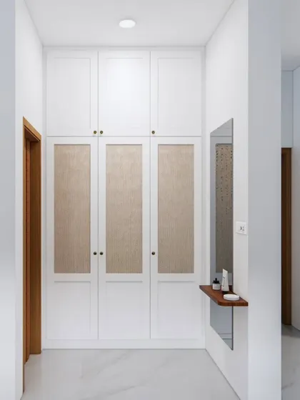 A render of a sleek, white floor-to-ceiling storage unit in a hallway, providing ample space while maintaining a minimalist aesthetic.