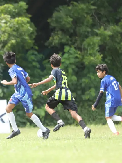 Chasing down every ball. Sidhaan demonstrates his relentless work rate, pursuing an opponent during a match.