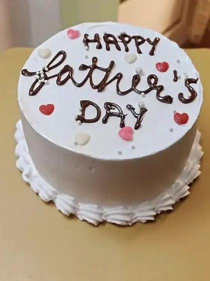 Another one of my simple Father's Day cakes, decorated with little hearts to show all the love.