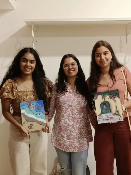 I love seeing the variety of art that comes out of each session. From dreamy beach scenes to charming doorways, everyone brings their own unique style.