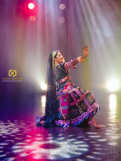 A glimpse of my vibrant Kalbelia performance, where stories are told with every twirl and twist. The dramatic lighting helps create a world of its own on stage.