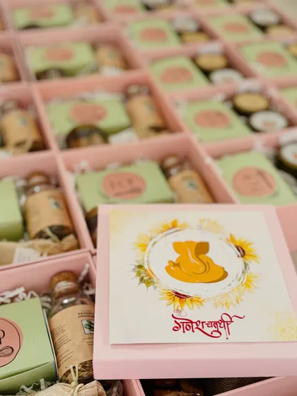 Sending blessings with every hamper for Ganesh Chaturthi. We created these custom pink boxes with a special Ganpati card for a client's festive gifting.