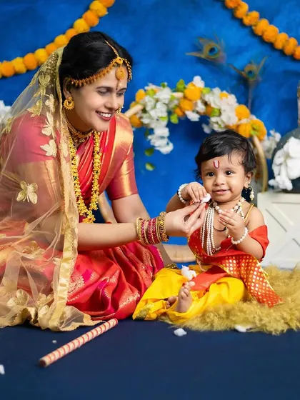 We also offer creative and traditional themes. This beautiful 'Yashoda and Krishna' setup is a wonderful way to celebrate culture and create a unique portrait of a mother and child.