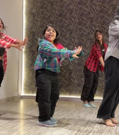 A candid shot from our anniversary celebration performance. I love seeing the kids completely lost in the music and the movement.