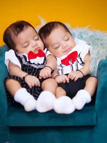 Double the cuteness. This 'Boss Babies' themed shoot with newborn twins was so much fun to create, capturing them sleeping peacefully in their tiny coordinated outfits.