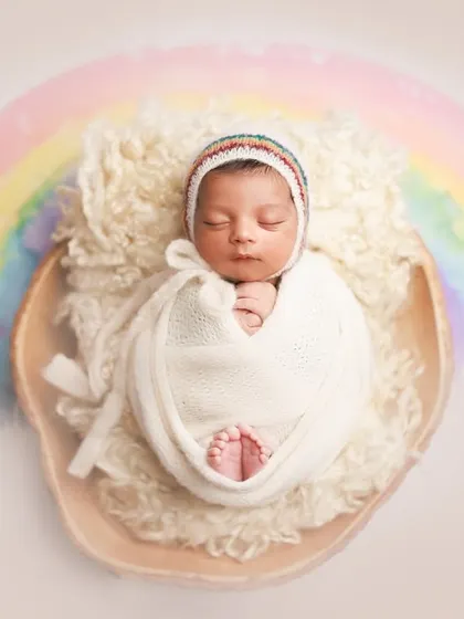 A little rainbow of joy. This setup is especially meaningful for 'rainbow babies' and is a beautiful way to celebrate their arrival. The soft colors create a hopeful and gentle image.