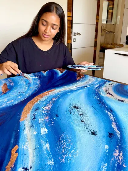 The base of this abstract painting looked like ocean waves. I love building up layers of texture and color to see what emerges.