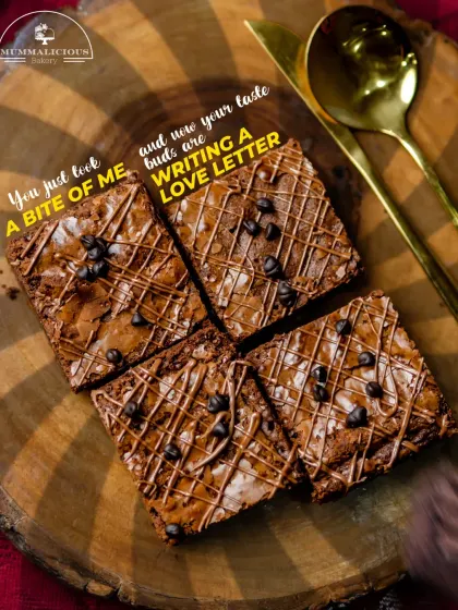 One bite of my Bounty Brownie and your taste buds will be writing a love letter. This close-up shot shows the rich, gooey texture and chocolate drizzle that makes them so special.