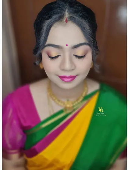 A simple and subtle makeover for a housewarming. You can learn how to use a pop of color on the eyes and lips to complement a traditional cotton saree.