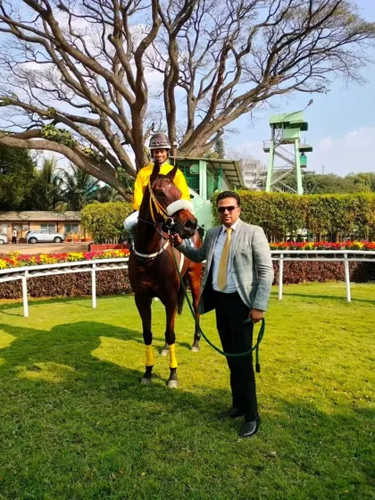 Stellar Gold, with jockey Darshan R.N, after winning the memorial cup.