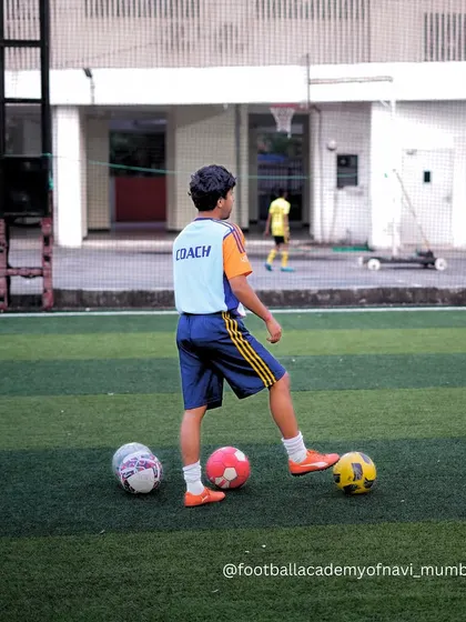 A young player wearing a "COACH" bib shows that leadership can be nurtured at any age. I encourage players to learn from and teach each other.