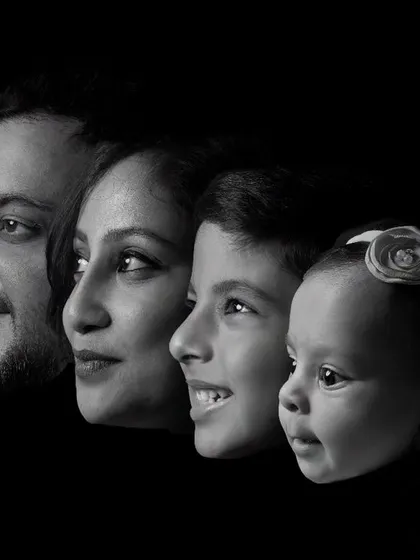 A legacy in a single frame. This artistic black and white composite portrait layers the profiles of a family, creating a powerful and modern heirloom that tells the story of generations.