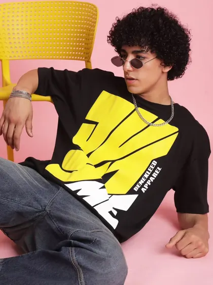 Another angle showcasing the powerful graphic tee. I paired it with a simple silver chain to add a touch of metallic detail without distracting from the main piece.