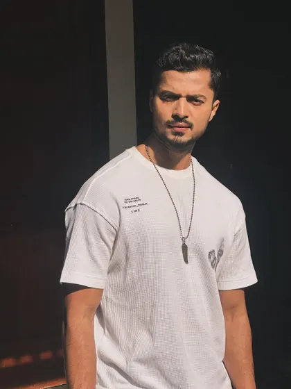 A close-up shot in a casual tee, highlighting my features.