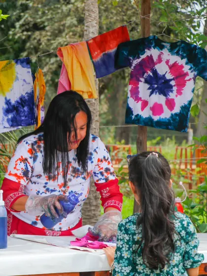 A tie-dye workshop in action during our colorful Holi celebration.