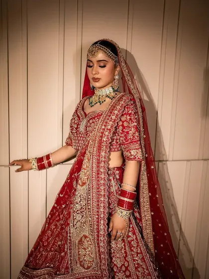 A full-length view of the bride, showing how the makeup and styling come together with the entire outfit. Our goal is to create a complete, harmonious look that makes the bride feel magnificent.