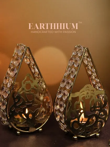 Illuminate your Diwali with these stunning Laxmi and Ganpati tea-light holders from my crystal collection. They add a divine touch and are available individually or as a set.
