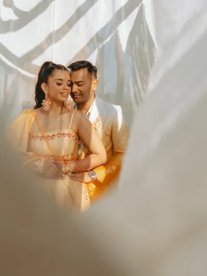 An intimate embrace, with soft, dreamy lighting creating a romantic and ethereal mood.