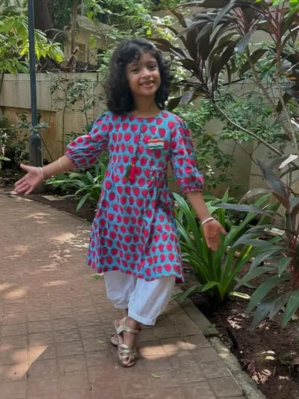 An essential staple in a girl's wardrobe is something she feels comfortable in. This strawberry print kurta set is perfect for patriotic celebrations or any festive day.