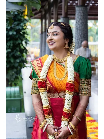 A beautiful portrait of Ashwini, capturing the joy and excitement of her wedding day.