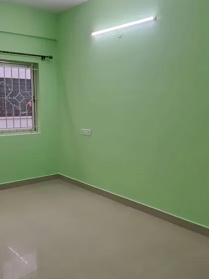This series of images shows a complete apartment repaint. We used a pleasant light green color to give the entire home a consistent and clean appearance, perfect for a rental unit.