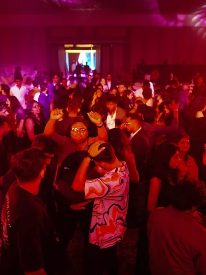 The view from my console during a high-energy corporate party. A packed dance floor under the lights is the goal for every event I play. Pure mayhem.