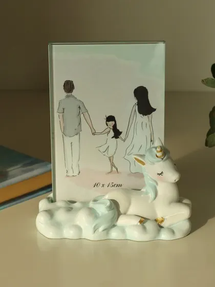 The unicorn photo frame, a perfect blend of whimsy and sweetness. Its gentle design and soft colors make it an ideal frame for capturing the innocence of childhood.