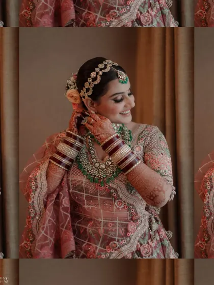 A creative multi-layered shot of the bride smiling as she adjusts her jewelry.