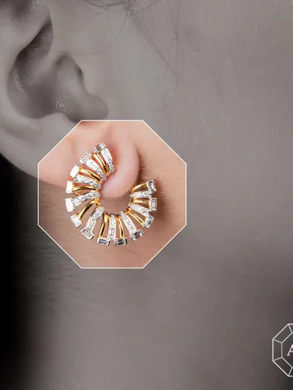 Elevate your style with our versatile 18k gold ear clips. The spiral design is set with baguette and round diamonds, crafted to complement both Indian and Western outfits with a touch of modern luxury.