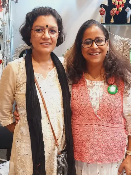 A moment with a fellow entrepreneur and friend at our stall. The support from our community is what keeps us going.