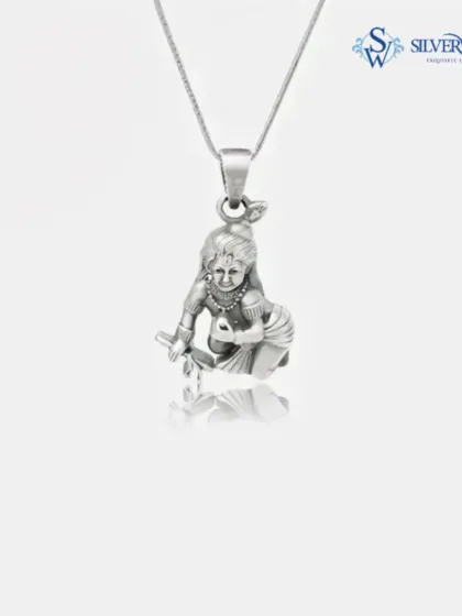 My Bal Gopal silver pendant, spiritually carved from 92.5 silver. This piece is perfect for daily wear, keeping a symbol of divinity close to your heart. The delicate chain complements the detailed craftsmanship of the pendant.