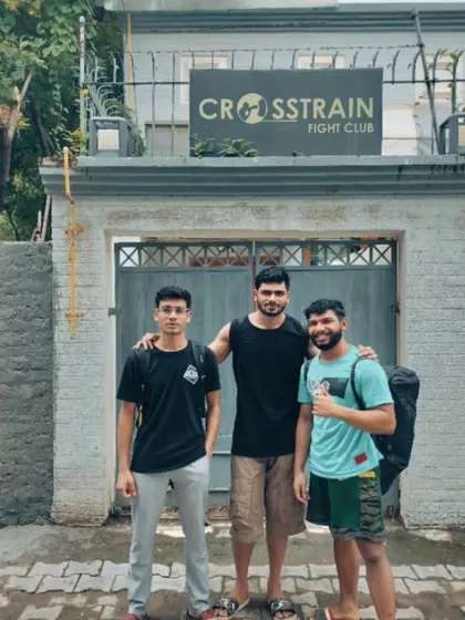 Brothers in arms. Three of our members outside the gym after a training session. The friendships built here extend beyond the gym walls.