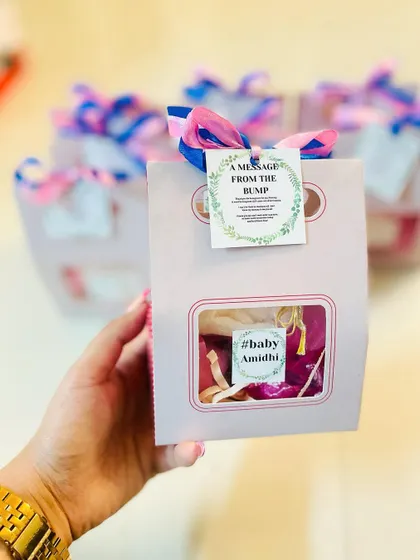 This baby shower favor features a "message from the bump" tag, a sweet and personal touch for your guests.