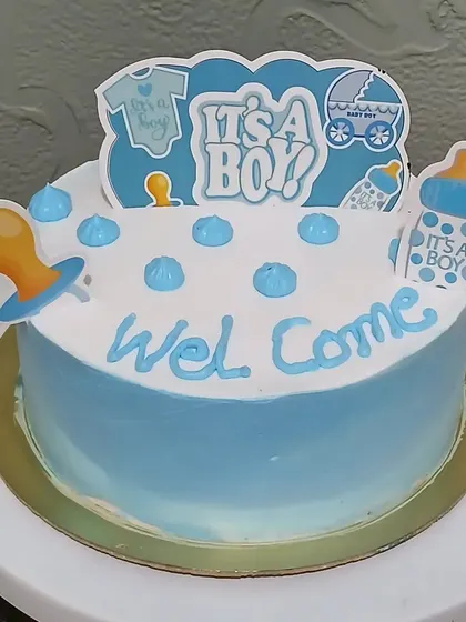 A simple "It's a Boy" cake to welcome a new baby.