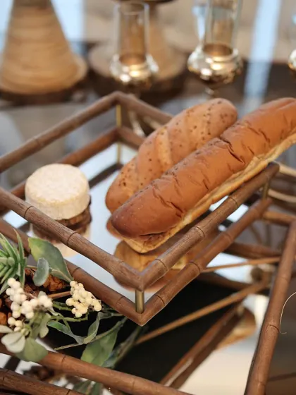 Freshly baked baguettes and cheese served on our two-tiered mirror tray with a wooden bamboo-style frame. It’s an essential piece for creating an elegant grazing table.