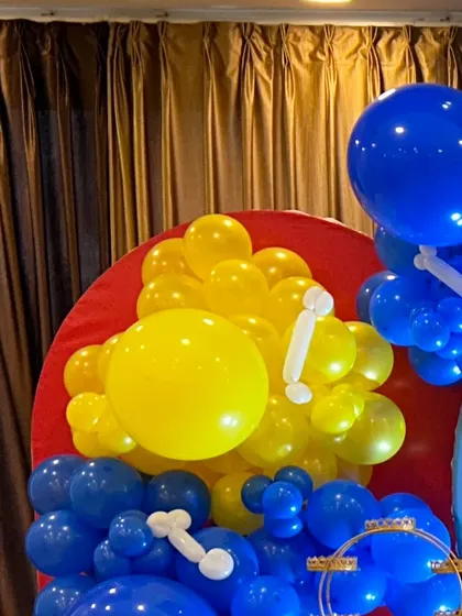 A detail of the balloon work for the Paw Patrol theme, using the signature red, yellow, and blue colors of the show.
