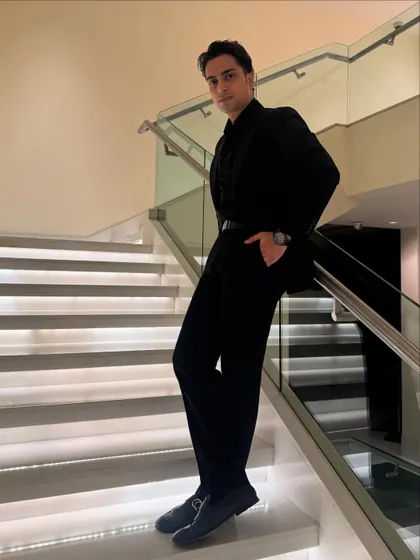 A full-length shot showcasing my style. I believe in looking the part for every luxury event, from the boardroom to the ballroom.