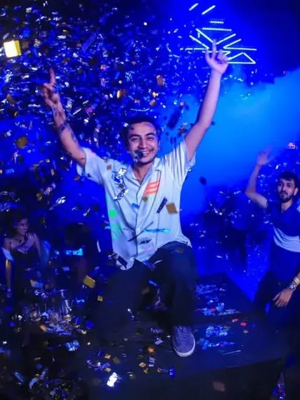 Jumping high above the crowd during a confetti blast at Club Illusions. This fisheye shot captures the explosive energy and celebration of a signature #teamnelson night.