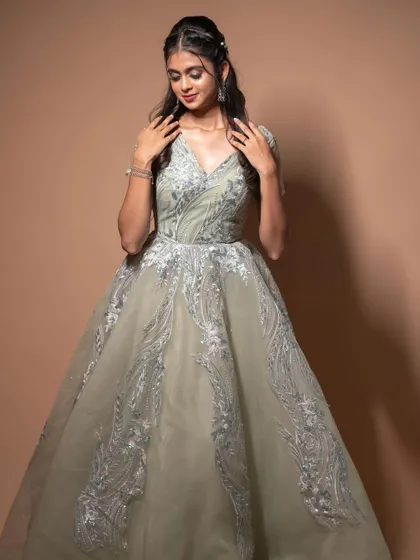 A duplicate of image 64, showing the gown's elegance.