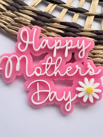 A sweet and simple "Happy Mother's Day" charm in pink layered acrylic with a daisy accent. Perfect for cupcakes or small cakes.